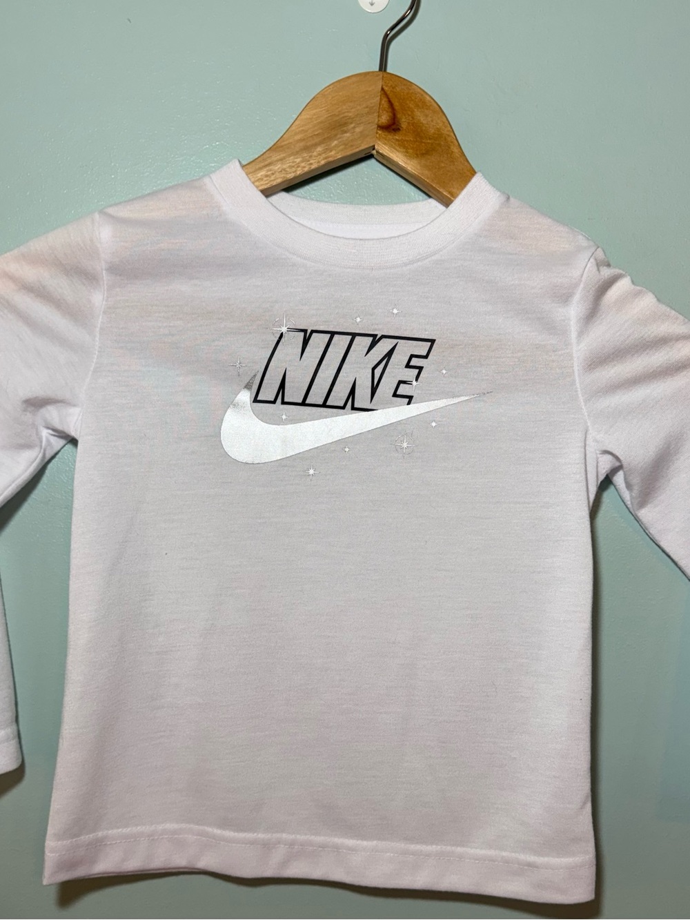 Nike White Long-Sleeve Kids Logo Tee with Silver Accents